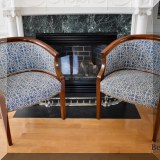 F12. Pair of curved back chairs with blue and white fabric. 31”h x 26”d x 24”w 